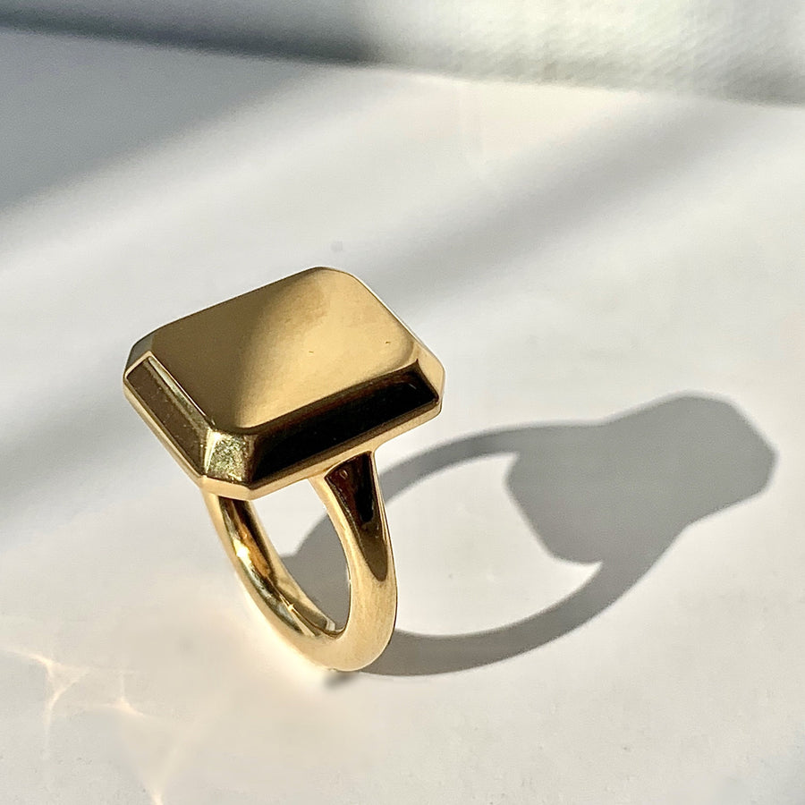 Shop our best-selling emerald charm yellow gold signet ring, perfect everyday staple. Jewellery that lasts forever, designed in London.